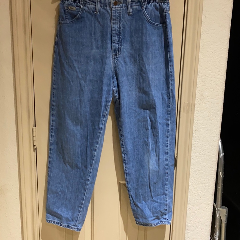 Lee vintage jeans side elastic at the waist.  S-12